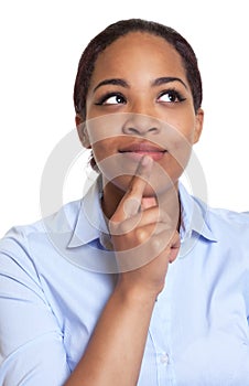 Portrait of a thinking african woman in a blue shirt