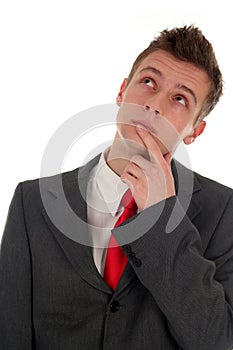 Portrait of thinking businessman