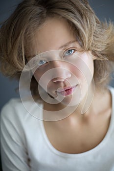 Portrait of thoughtful beautiful woman sensually looking in camera
