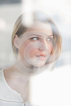 Portrait of a thoughtful blonde woman looking away