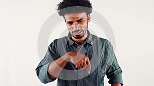 Portrait of a thoughtful crying man on a white background