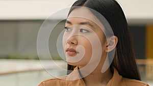 Portrait thoughtful pensive Asian woman dreaming chinese japanese girl relaxed korean businesswoman think ponder imagine