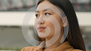 Portrait thoughtful pensive Asian woman dreaming chinese japanese girl relaxed korean businesswoman think ponder imagine