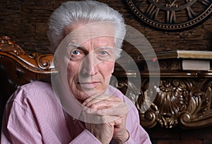 Portrait of a thoughtful senior man posing at home