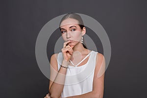 Portrait of thoughtful woman with mysterious look