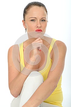 Portrait of a Thoughtful Young Woman Pondering a Problem