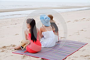 Portrait three asia women, girls group friends having fun together on the beach