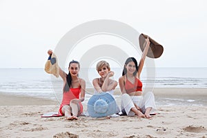 Portrait three asia women, girls group friends having fun together on the beach