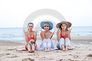 Portrait three asia women, girls group friends having fun together on the beach