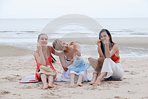 Portrait three asia women, girls group friends having fun together on the beach