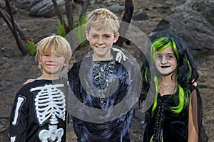Portrait of three friends in Halloween costume