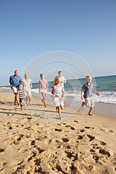 Portrait Of Three Generation Family On Beach