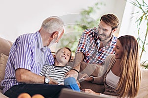 Portrait of a three generation family spending time together