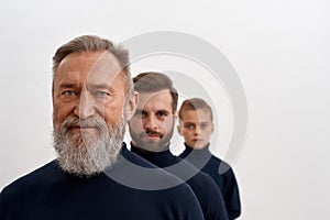 Portrait of three generations of men in row