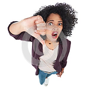 Portrait, thumbs down and top view of black woman in studio isolated on white background. Dislike emoji, failure hand