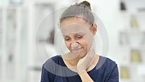 Portrait of Tired African Woman having Neck Pain