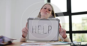 Portrait of tired and frustrated woman working secretary, stressed at desk