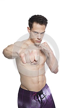 Portrait Of Tough Boxing Guy Punching