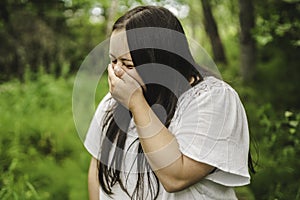 Portrait of trisomy adult outside having fun