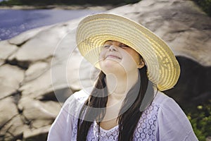 Portrait of trisomy adult outside having fun