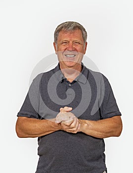 Portrait of trustful smiling mature man