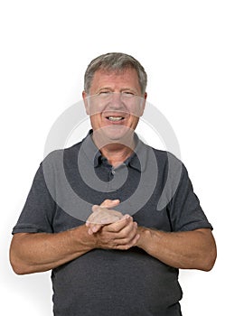 Portrait of trustful smiling mature man photo