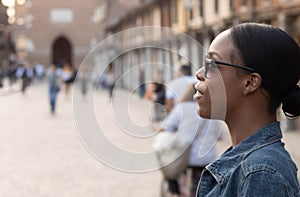 Portrait of turist woman dressed in white getting to know Europe, Ferrara. Italy