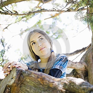 Portrait of Tween Girl in Tree
