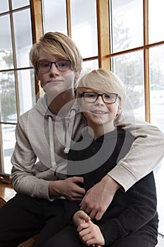 Portrait of two blonde brothers