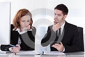 Portrait of two business colleagues at office