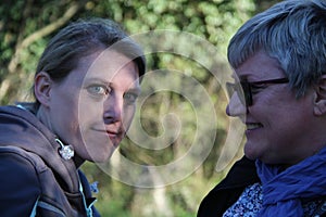 A portrait of two collegue ladies in the nature