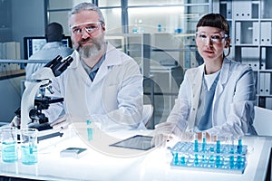 Doctors examining analysis in the lab