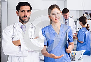 Portrait of two doctors in medical office