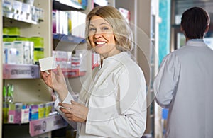 Portrait of two employed pharmacists