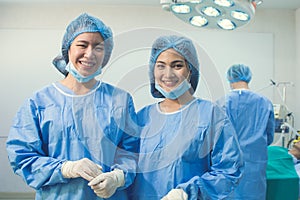 Portrait of two female doctors in operation uniform