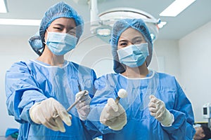 Portrait of two female doctors in operation uniform
