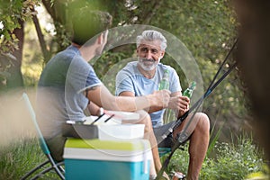 portrait two friends fishing