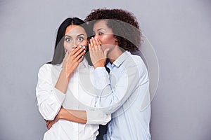 Portrait of a two girls gossip