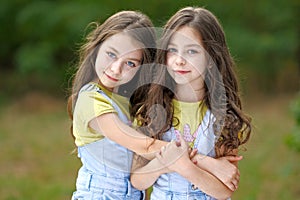 Portrait of two girls twins