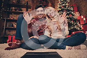 Portrait of two handsome beautiful girlfriend boyfriend cheerful spouses calling web waving hi greetings newyear indoors