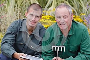 portrait two happy gardeners