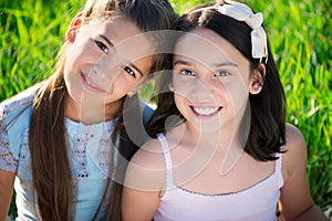 Portrait of two hispanic teen girls