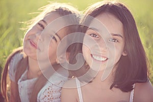 Portrait of two hispanic teen girls