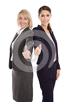 Portrait: Two isolated successful happy business woman making th