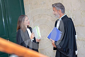 portrait two judges meeting