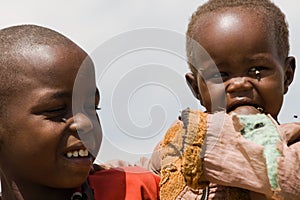 Portrait of two Masai children in Masai Mara