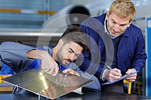 portrait two metal factory workers