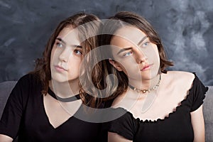 Portrait of two natural  teenage girls. Close up lifestyle portrait of two young girls best friends