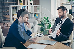 Portrait of two nice attractive handsome classy imposing trendy men economist financier agent broker signing contract hr