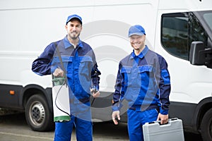 Portrait Of Two Pest Control Workers photo